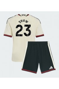 Manchester United Luke Shaw #23 Jalkapallovaatteet Lasten Kolmas peliasu 2026-27 Lyhythihainen (+ Lyhyet housut)